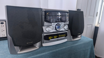 Sharp CD-C606 with original remote and atenna