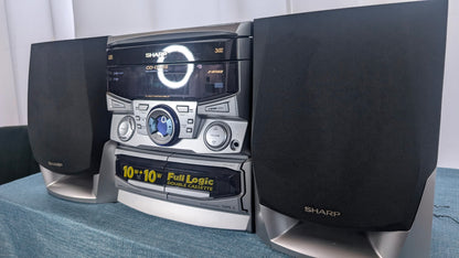Sharp CD-C606 with original remote and atenna