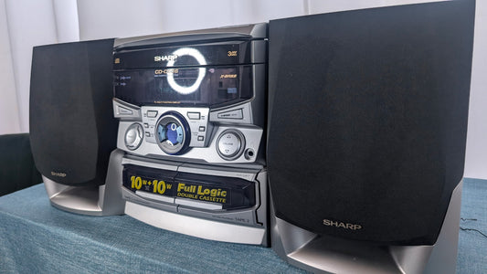Sharp CD-C606 with original remote and atenna