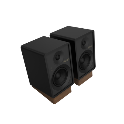 Onkyo GX-30ARC powered monitor in Black, angled view with grille off showing 4-inch woofer and tweeter