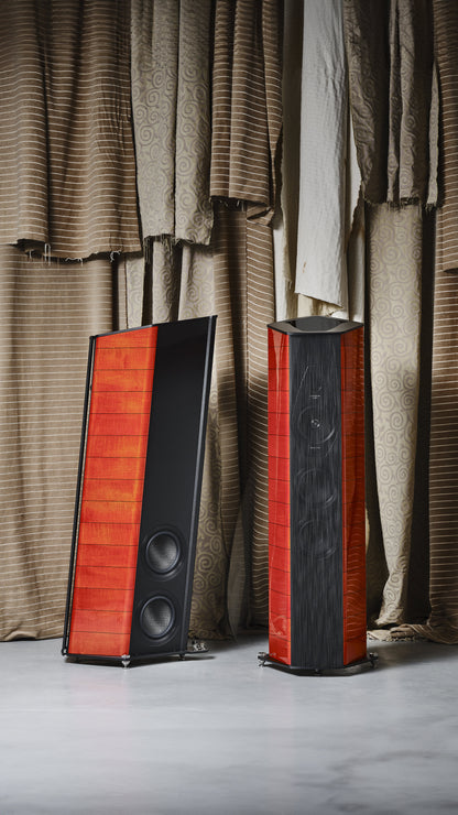 A pair of Sonus faber Il Cremonese Ex3me speakers showcasing the front and back sides in Red Violin high gloss wood.
