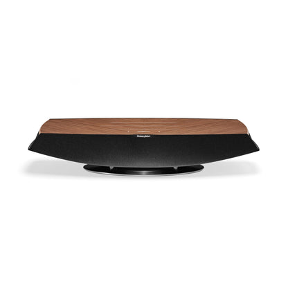 A front view of the Sonus faber Omnia wireless bookshelf speaker in walnut wood finish.